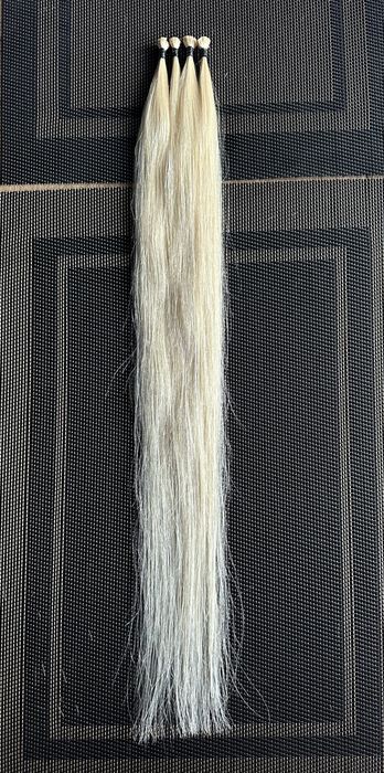 Натуральные волосы на капсуле