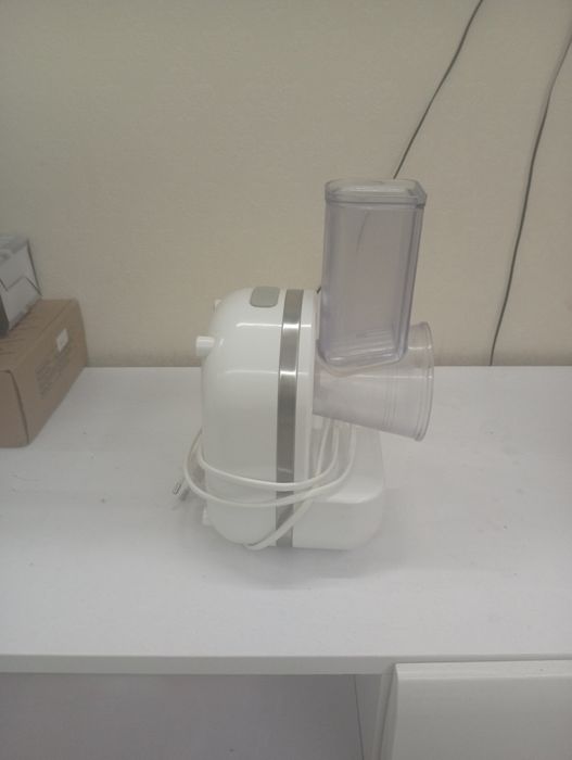 Электрическая овощерезке.