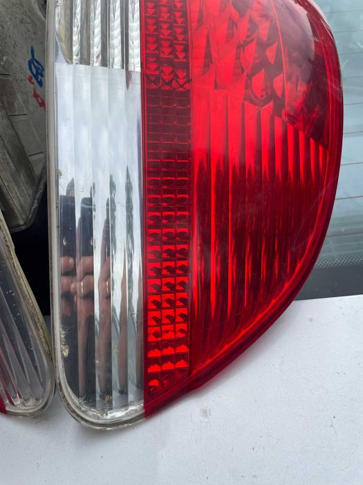Bmw 7 e65 przed LIFT lampa lewy prawy tył w błotnik biały kierunek
