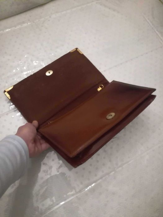 Duas Pochetes: preta e vermelha escura