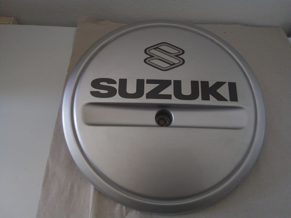 Capa de roda suplente Suzuki  jimmy