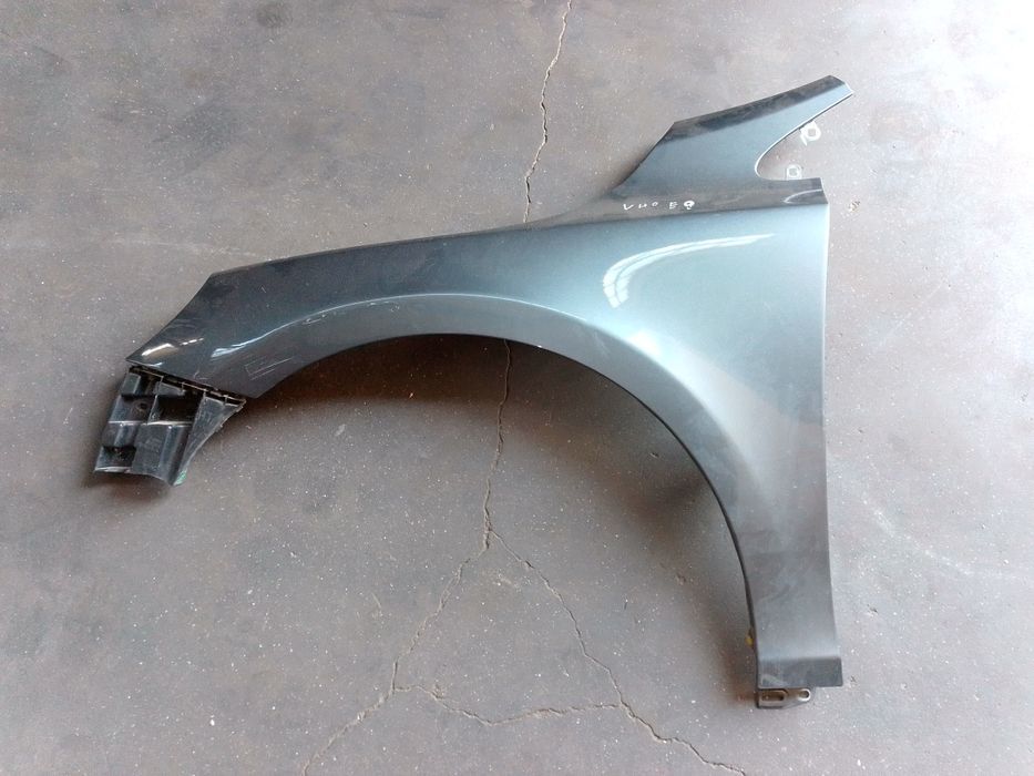Guarda lamas esquerdo Volvo V40 12-