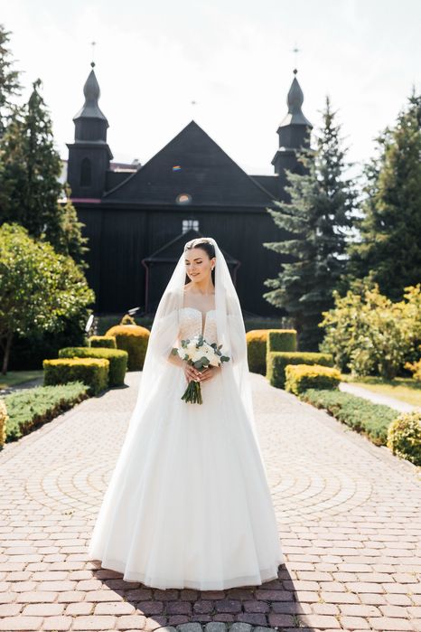 Весільна сукня кольору айворі