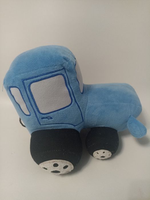 Мягкая игрушка синий трактор.