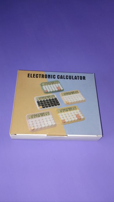 Рожевий калькулятор з круглими кнопками