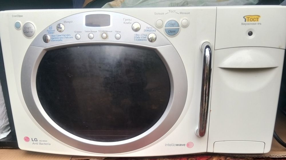 LG  Корея. мікрохвильова піч з тостером , грилем і електронним таймеро