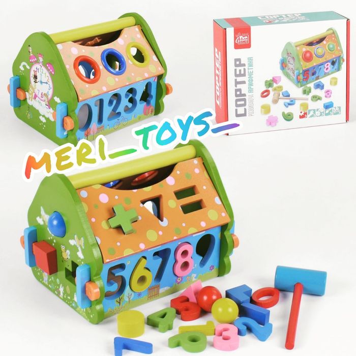 Дерев'яний будиночок-сортер