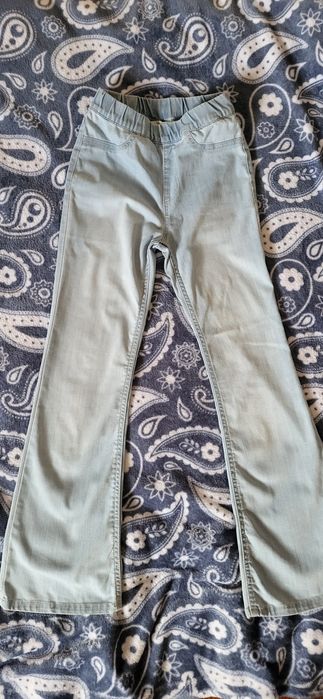 Miękkie jeansy spodnie 134 H&M