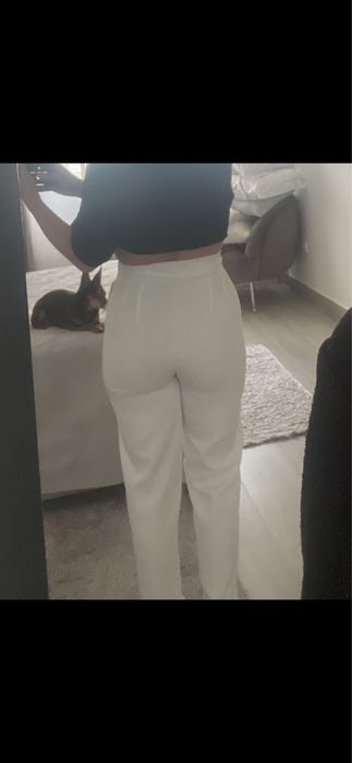 Calças de tecido brancas
