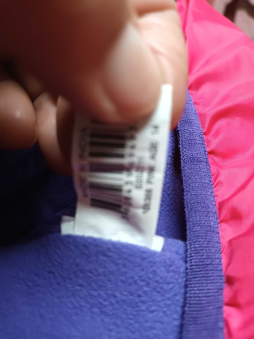 Casaco tipo kispo rosa e lilás em  muito bom estado