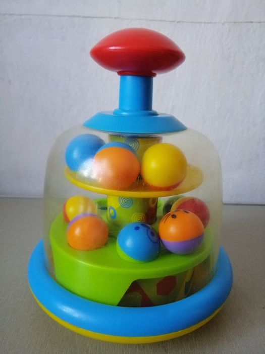 Дзига з кульками