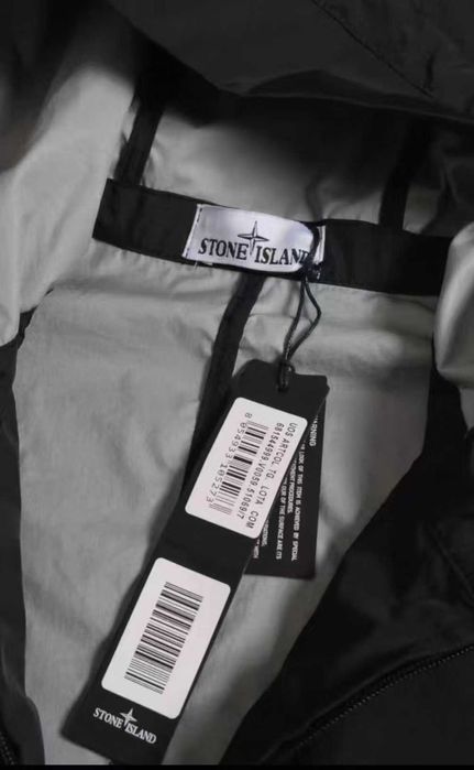 Relaksacyjna kurtka czarnego koloru marki Stone Island/L