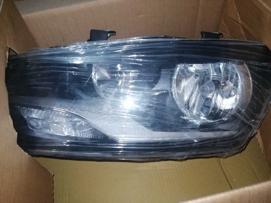 Farol ótica esquerdo vw polo