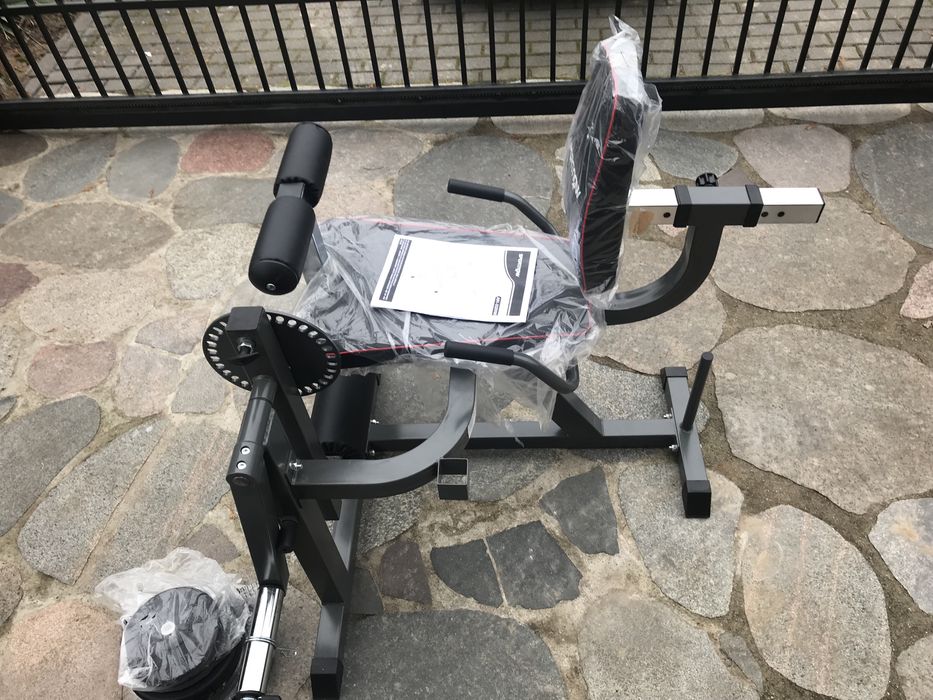 Maszyna do ćwiczeń mięśni nóg + obciażniki