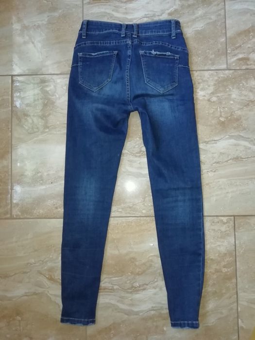 Spodnie jeans rurki zamki 36