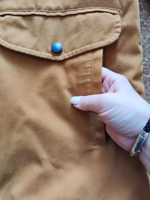 Продам рыжую парку ,мужскую