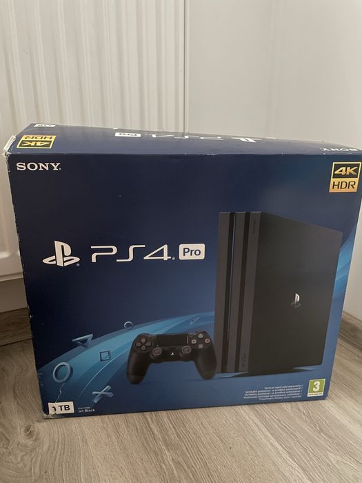 PlayStation 4 Pro 1TB + 2 pady + gra SnowRunner