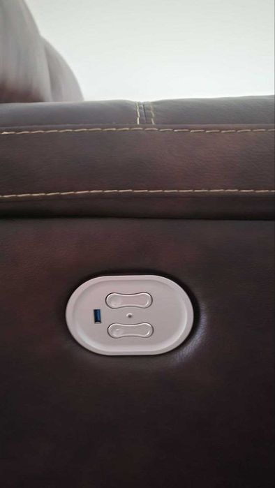 Leather reclining sofa, never used,  button control (seats/headrest)