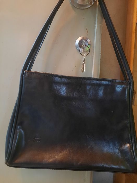 Mala preta pele genuina