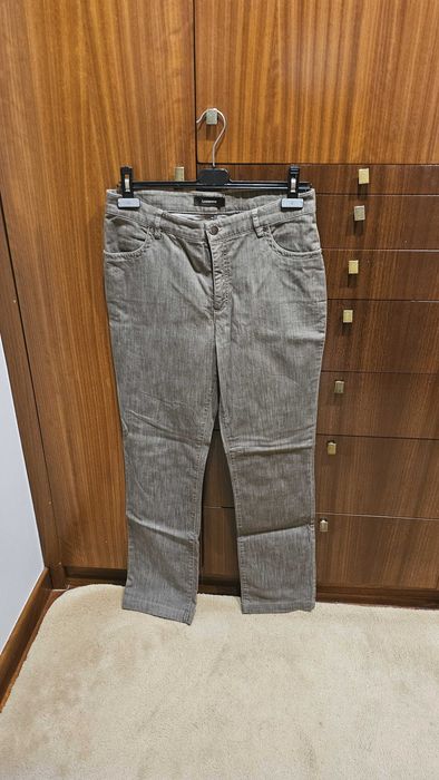 Calças ganga com aplicação bolso
