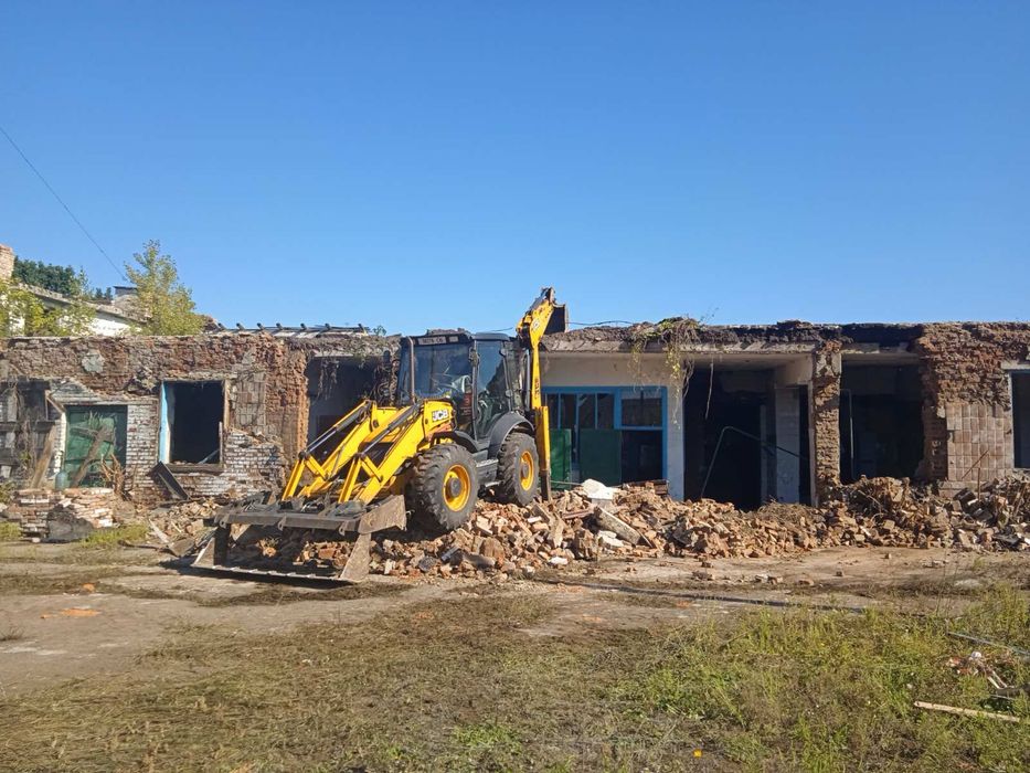 Послуги екскаватора навантажувача та повноповоротного