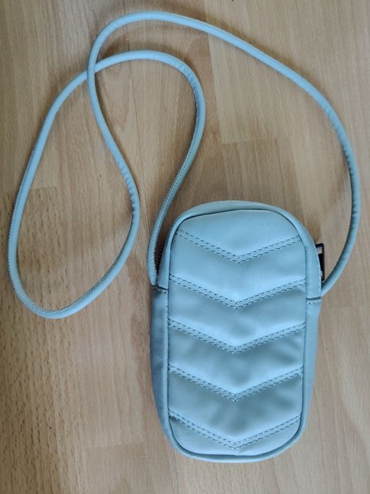 Mała skórzana markowa torebka Reserved błękitna