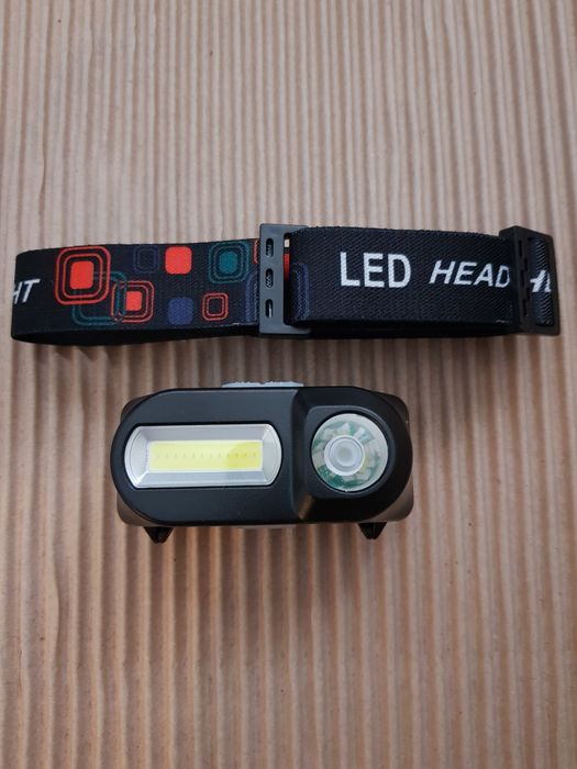 Налобный фонарь с двумя LED светильниками COB и XPE питание на 18650