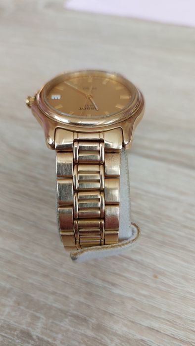 Złoty klasyczny zegarek Tissot