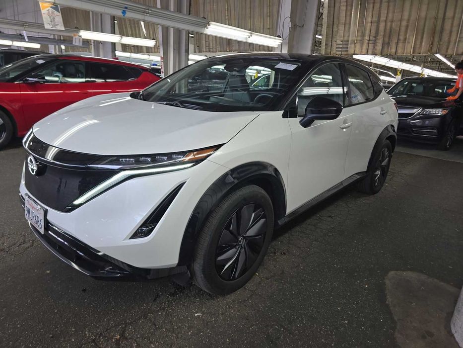 Nissan Ariya ENGAGE+ e-4ORCE 2023 — современный электрический AWD