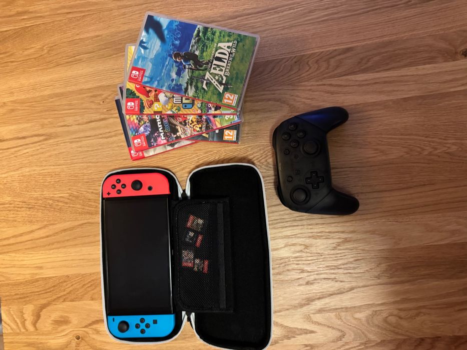 Nintendo Switch OLED + 5 gier + Pro Controller + etui