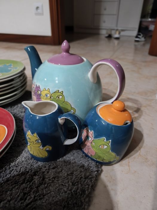 Conjunto de cozinha do gato preto
