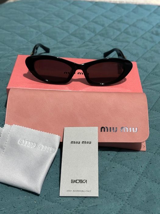 Oculos de sol com caixa