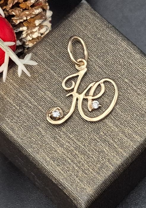 Złota zawieszka14K próby 585 literka "H" z cyrkoniami