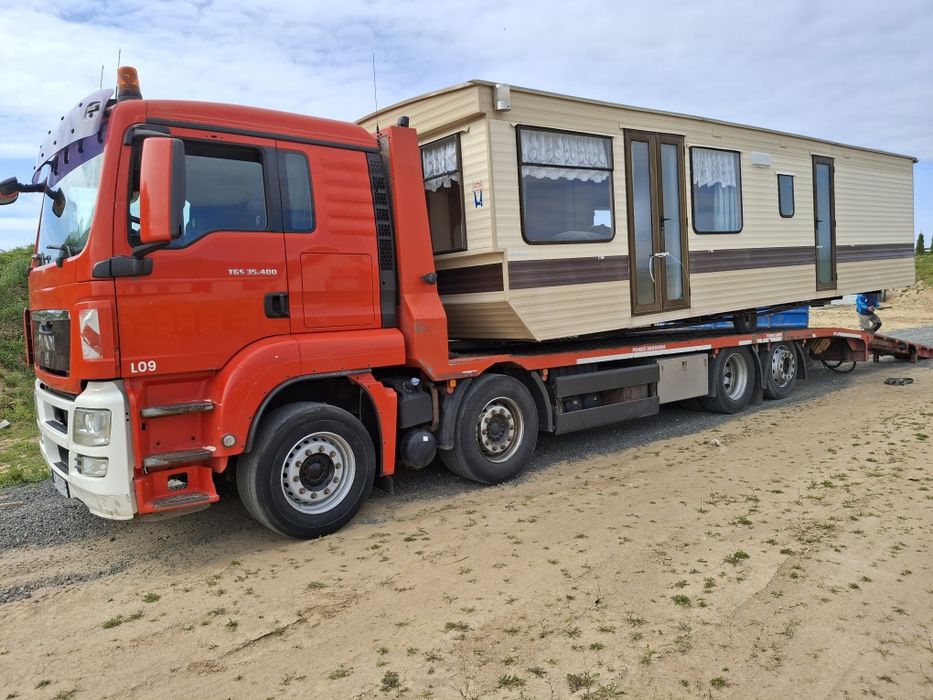 Transport laweta maszyny budowlane wozki widłowe koparki ładowarki