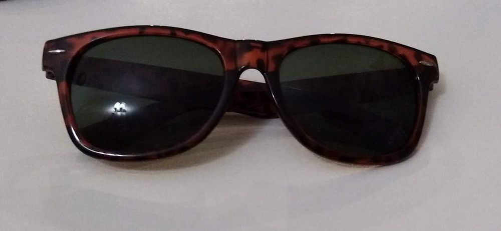 SALDOS Óculos de sol homem e senhora