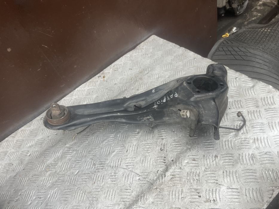 Задний рычаг продольный правый джип патриот 15г jeep patriot