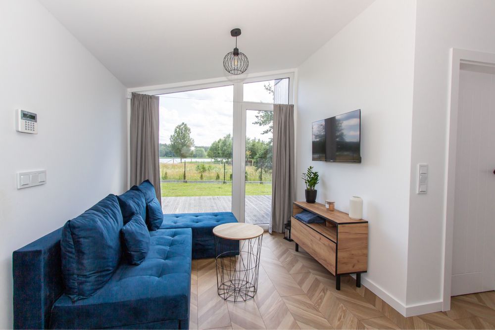 Domek letniskowy z widokiem na jezioro Spore