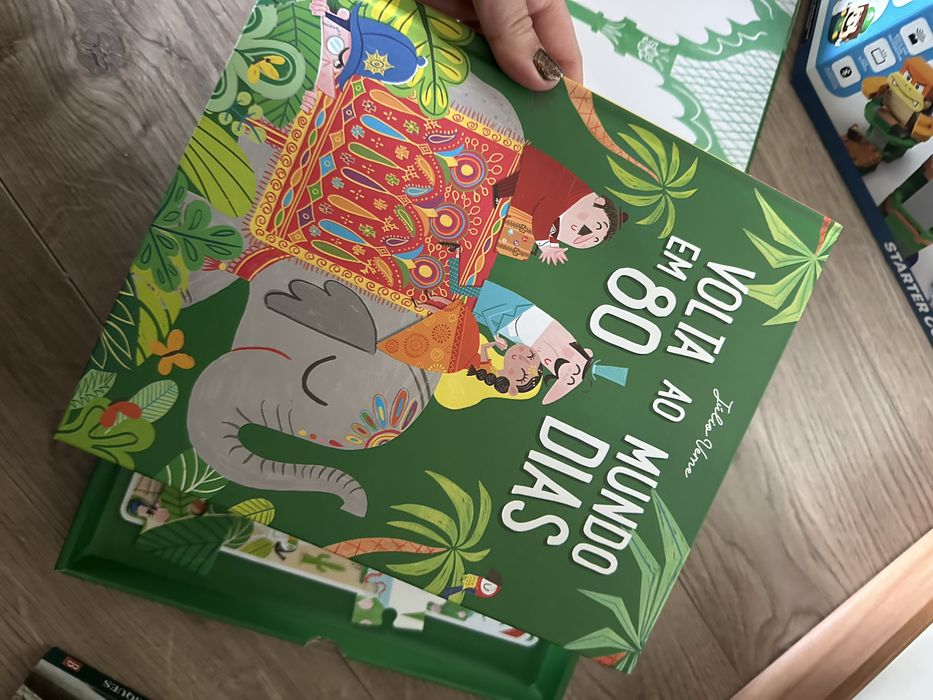 Livro com puzzle -volta ao Mundo em 80 dias
