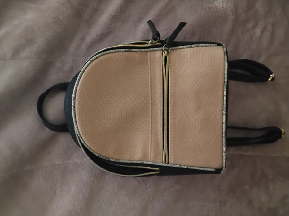 Light pink and black backpack64584878208129120