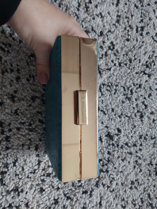 Clutch azul e dourada