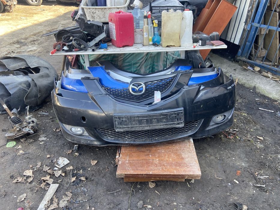 Передний бампер мазда 3бк телевизор уселитель капот