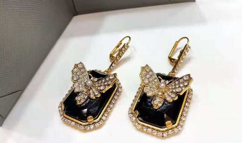 Alexander McQueen kolczyki motyle