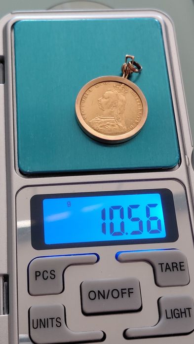 Libra Ouro com Aro 1887