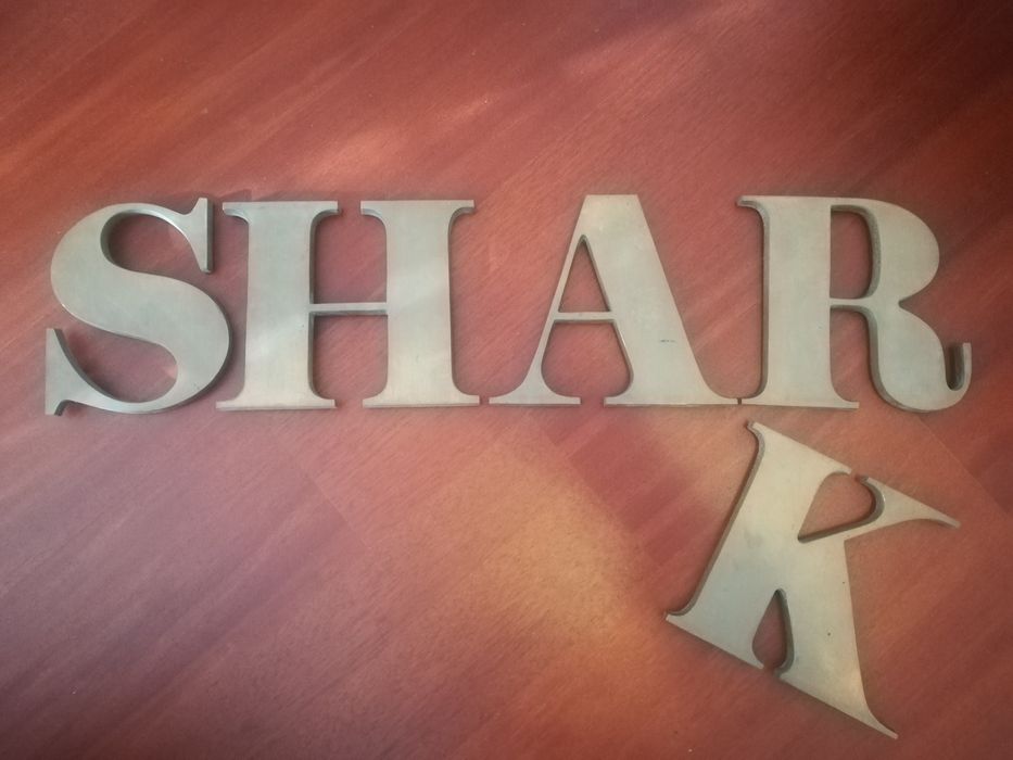 Conjunto de 7 Letras em Bronze.