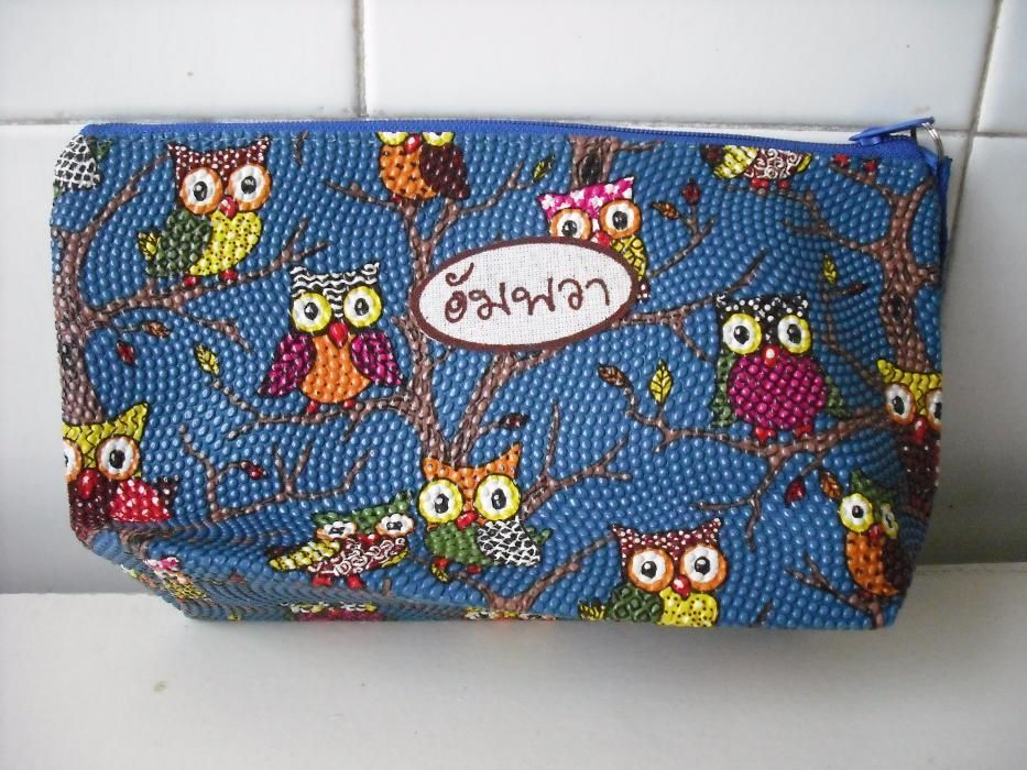 Bolsa tailandesa com mochos