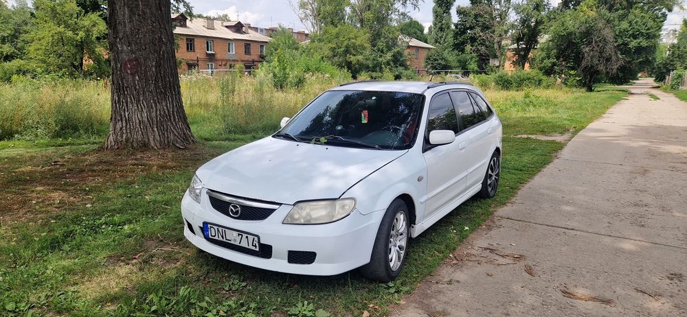 Мазда 323 Protege5 GXI