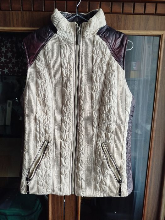 Жіночі теплі жилети б/у