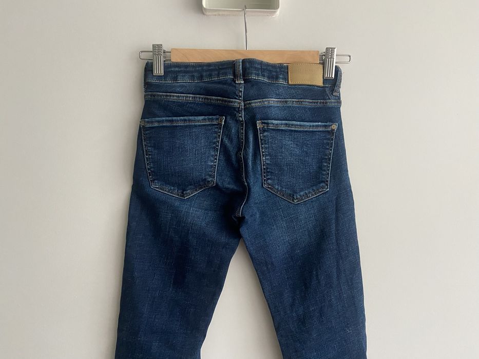 Zara niebieskie jeansy embrace silhouette r 34