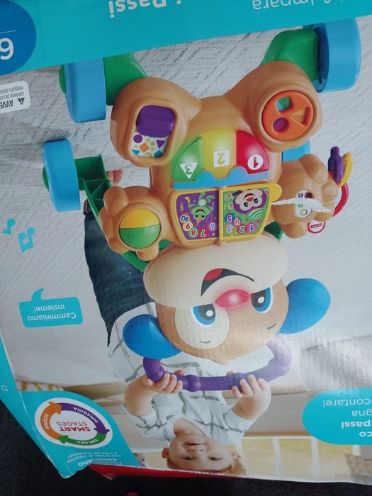 Нові Дитячі ходунки  візочок Fisher price італійською