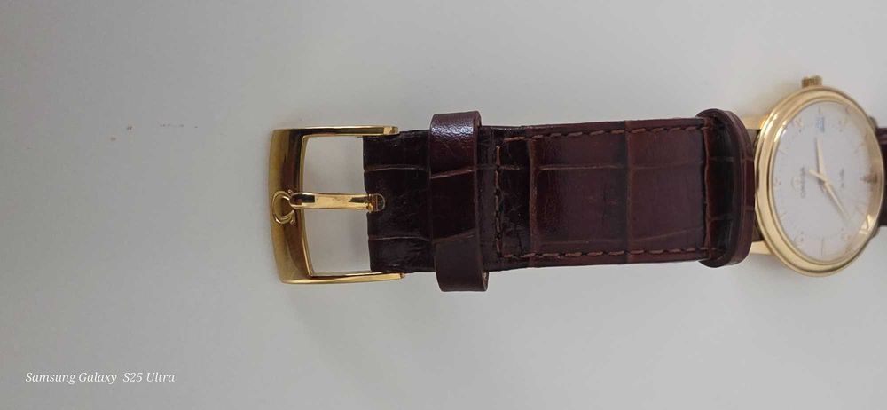 Złoty zegarek omega